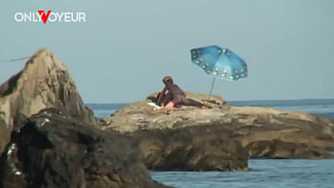 Sun-kissed lust fest: Beach babe's nude pics give way to raunchy afternoon delight under clear blue skies