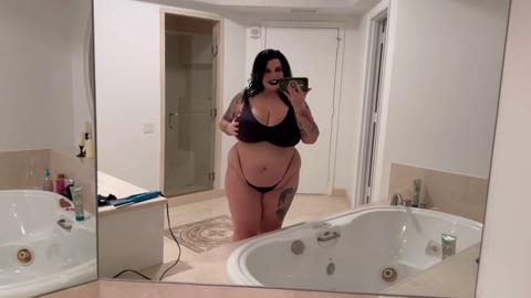Your filthy pleasure awaits, as this goth goddess tempts you with her titanic melons