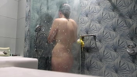 Sexy BBW beauty lingers in scorching hot downpour