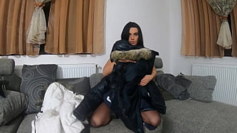 Older woman gets off on furry coat-wearing partner during sensual, sultry solo session