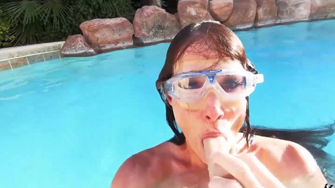 Brunette older Sofie Marie strokes her vulva underwater