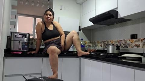 My stepmother's filthy slit throbs with pleasure, slapping her tits on the kitchen counter