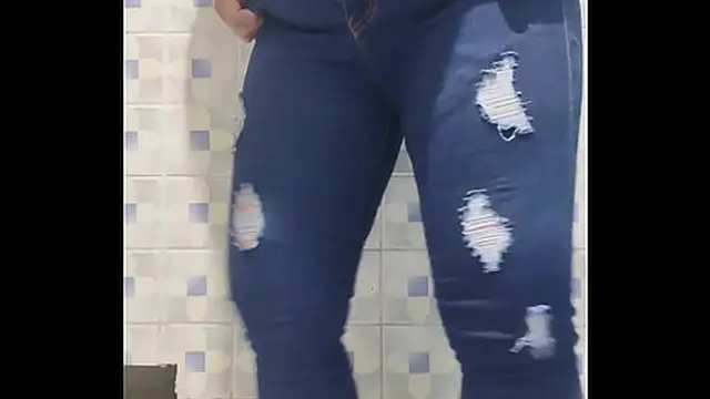 Mature woman caught in public bathroom