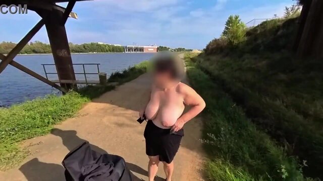 HOT MOM rides a bike naked with massive natural boobs