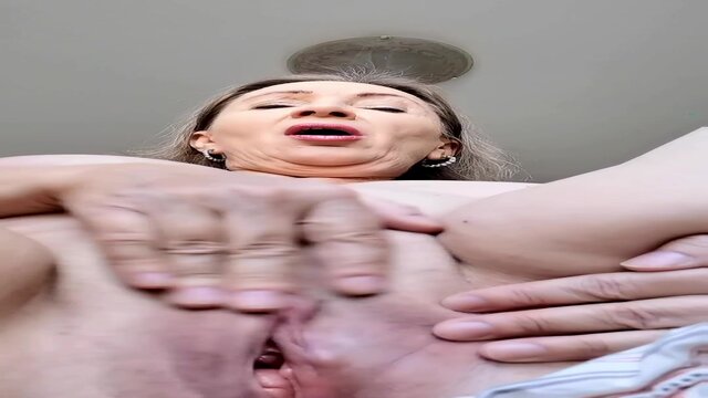 Mature cougar gives sultry solo performance in POV